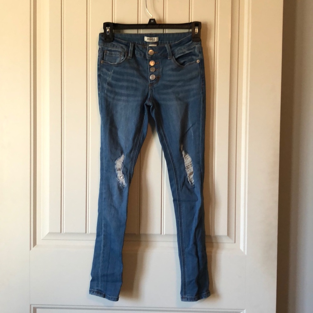 buttonfly jeggings with lined distressed knees.